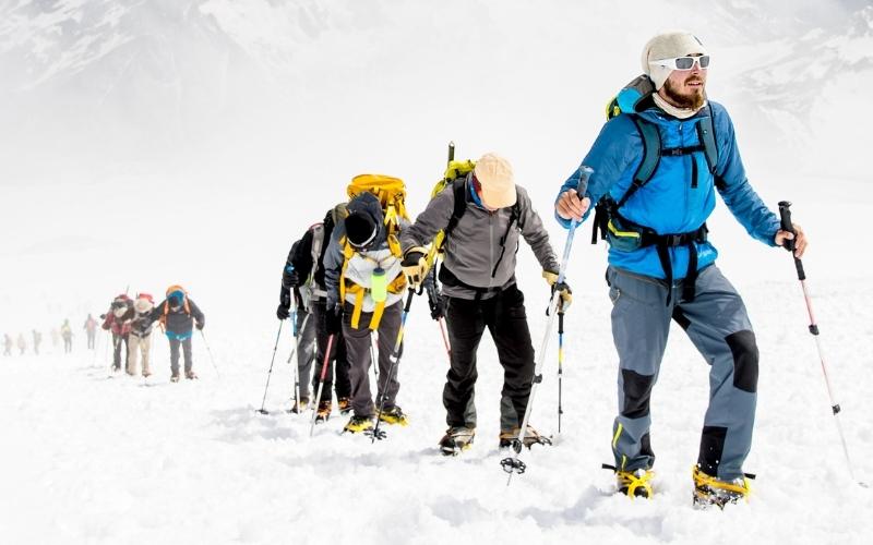 Explorers trekking through snowy mountains - a metaphor for marketing pitfalls