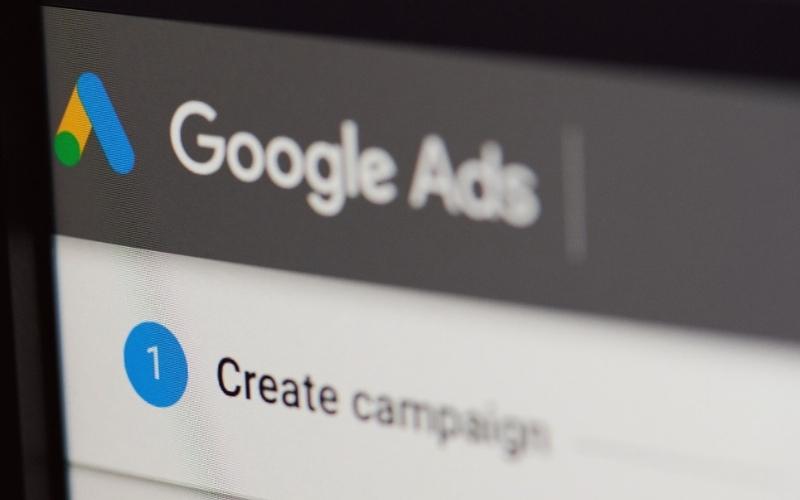 A photograph of the Google Ads interface on screen